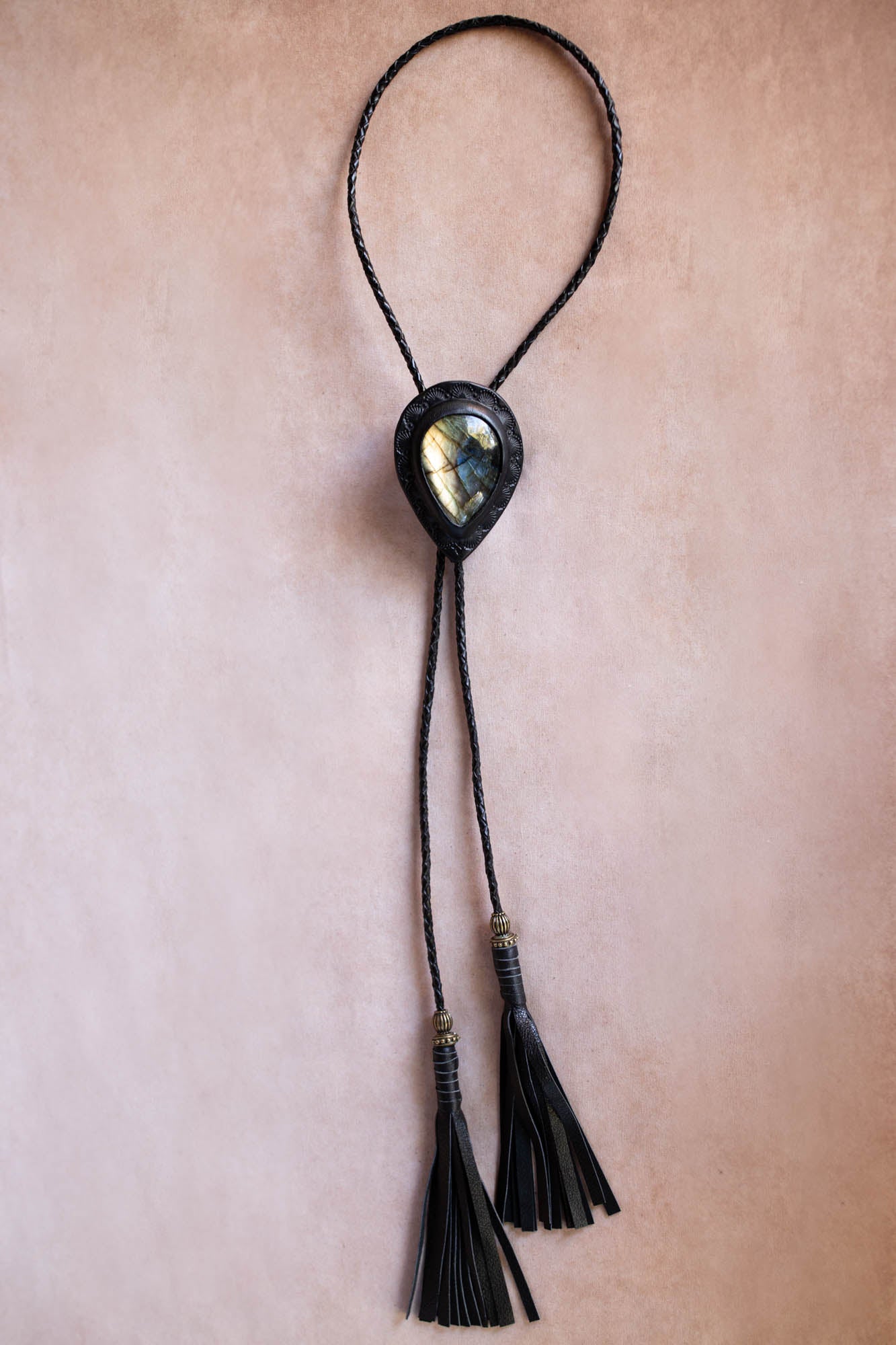 Bolo black leather necklace with a labradorite pendant and tassels 